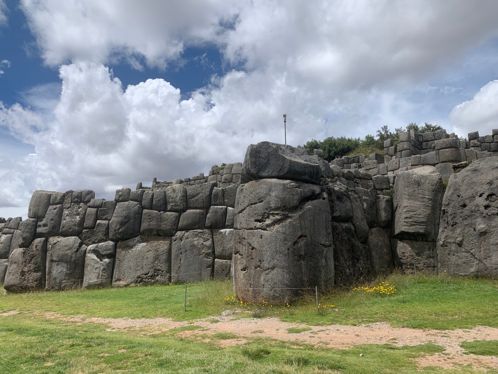image showing unique Incan stonemasonry with fitted stones, no mortar, and beveled edges